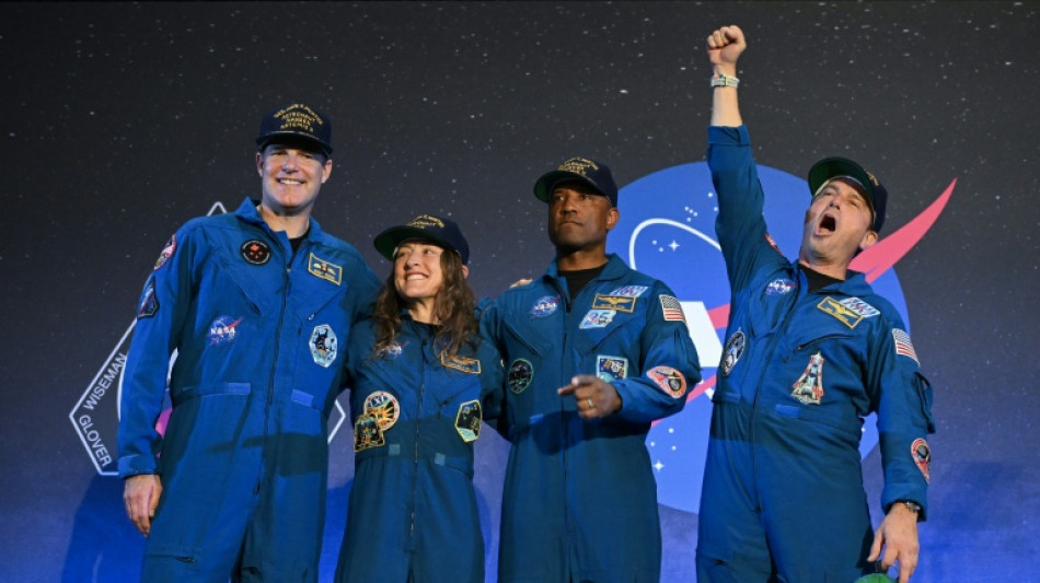 Artemis crew urges unity on 'lifeboat' Earth 