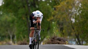 Reusser retains world time-trial title
