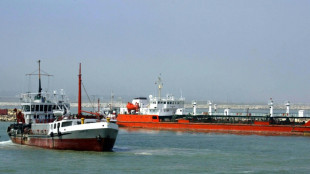 US stocks retreat from records as oil prices jump