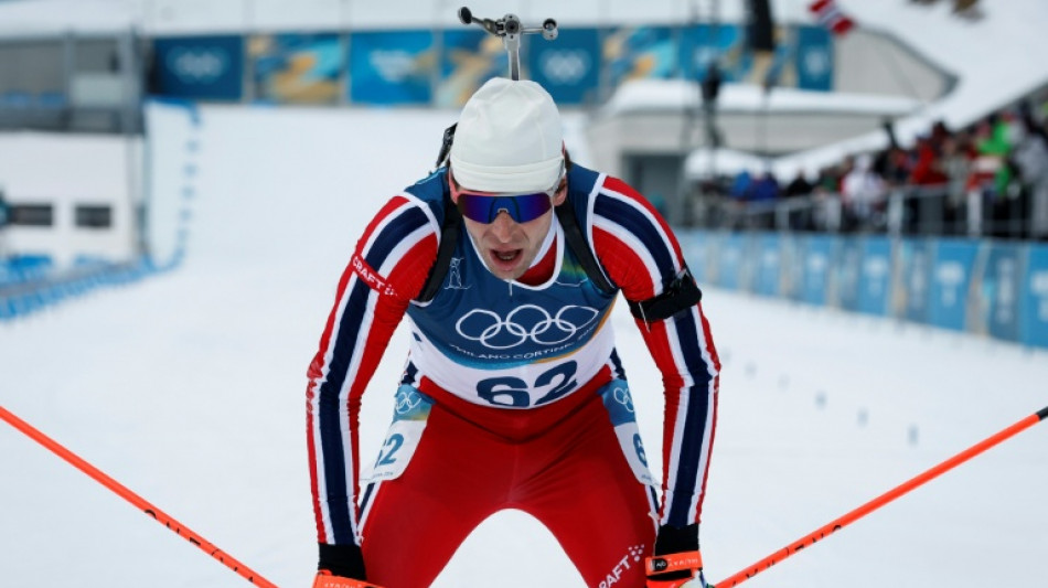 Olympic bronze medal biathlete confesses affair on live TV