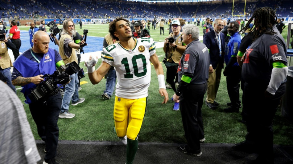 Packers' Love tames the Lions, Cowboys and 49ers march on