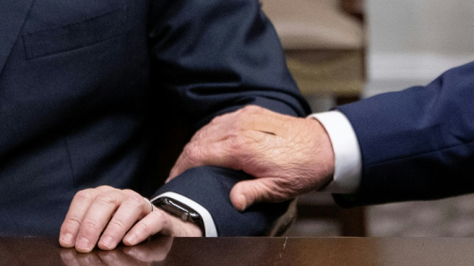 White House blames Trump's bandaged hand on handshakes