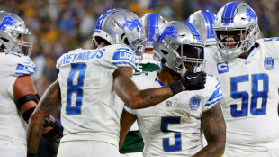 Lions maul Packers to take NFC North division lead