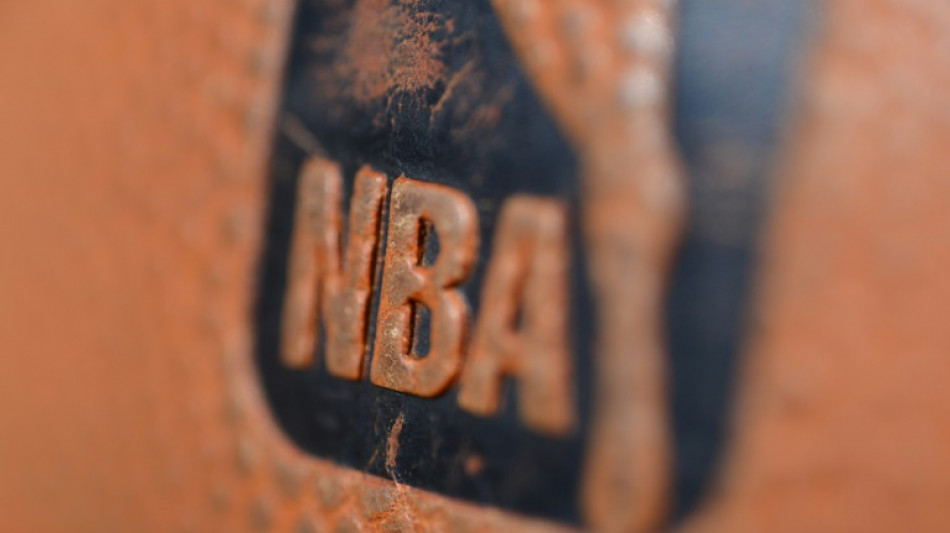 NBA adopts flopping penalty, expands coach's challenges