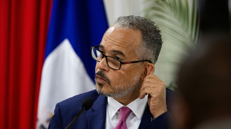 Haiti's transitional council hands power to PM