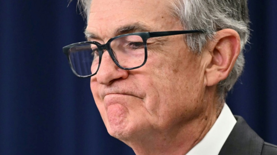 Stocks slip as investors await key Fed speech