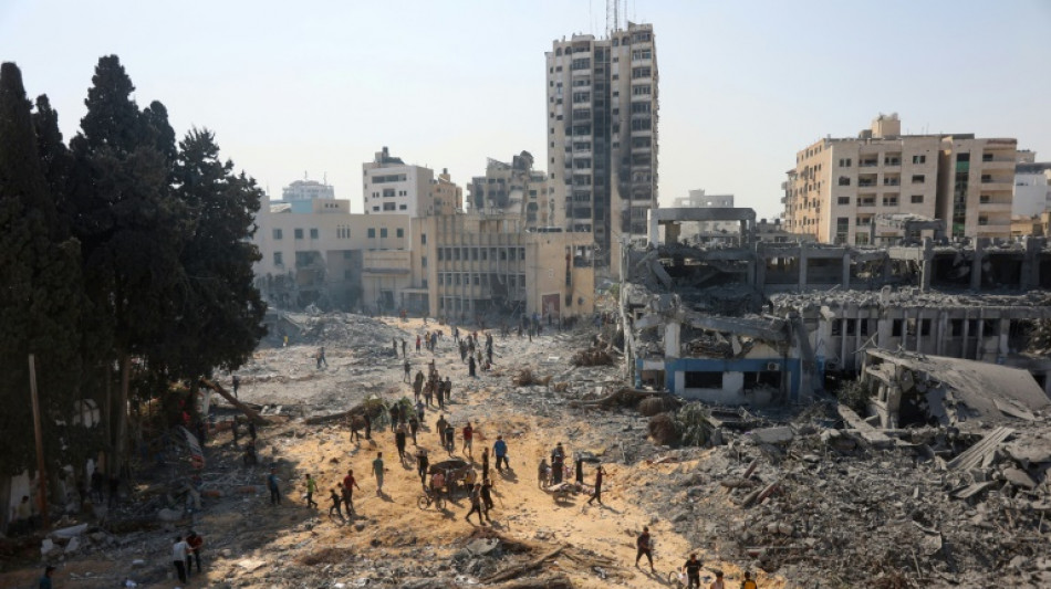 Des dizaines de corps dans la ville de Gaza, "progr&egrave;s" dans les discussions de tr&ecirc;ve selon Biden