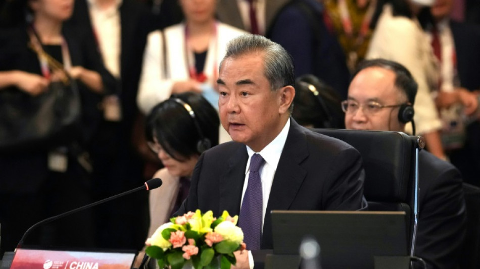 Top US, Chinese diplomats meet at ASEAN talks as tensions risk flaring