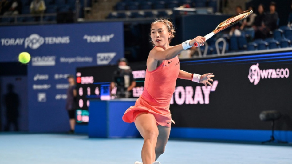 Olympic champion Zheng finds mojo to reach Tokyo semis
