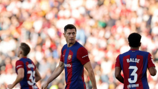 Barca fall behind Atletico after Rayo draw
