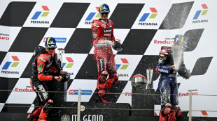 Bagnaia wins Indonesia MotoGP to reclaim title lead as Martin crashes