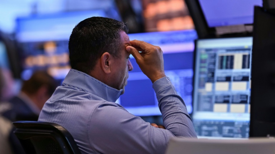 Wall Street ouvre en baisse après la perte du triple A de la dette américaine