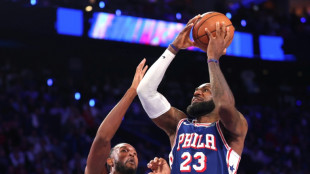 76ers rally to stun Cavs in James's first home game for Philadelphia