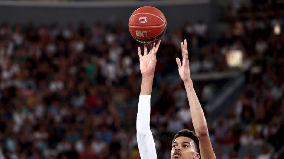 &Eacute;lite de basket: une saison de "Wembamania"