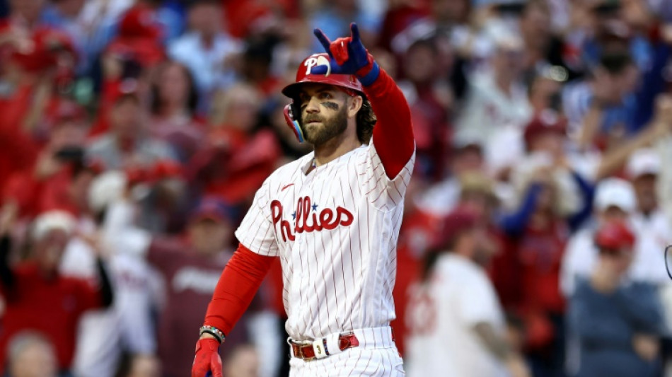 Phillies blast six homers to rout Braves in MLB playoffs
