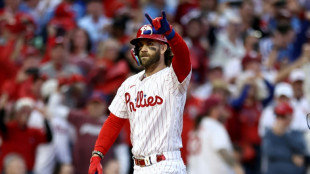 Phillies blast six homers to rout Braves in MLB playoffs