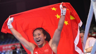 China's Wu sets sights on Olympics, Dusmatov 'a bit upset'