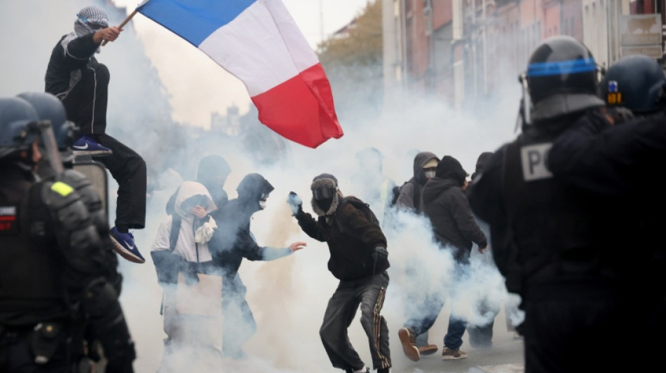 French police fire tear gas during fresh protests 