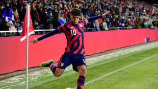 Pulisic double fires US over Mexico, Canada advance