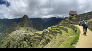 Touristen kehren zur Inka-Ruinenstadt Machu Picchu in Peru zurück