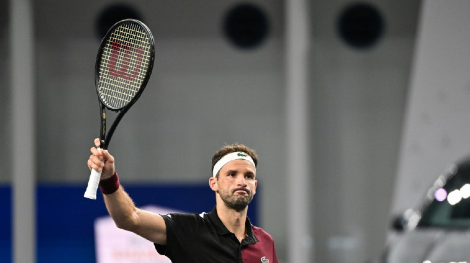 Dimitrov through to Shanghai Masters last 16