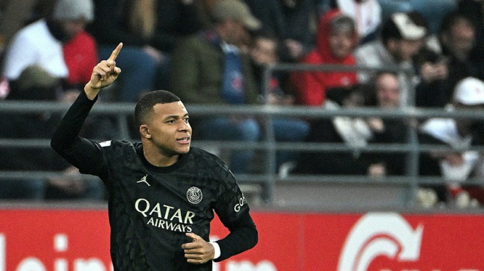 Mbappe hat-trick takes PSG top of Ligue 1