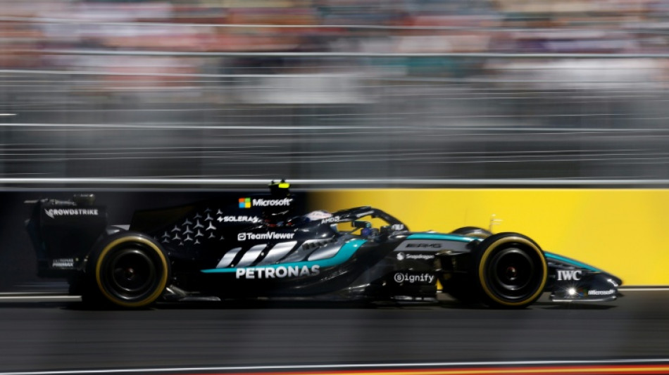Antonelli profits from safety car pause to win Spanish GP