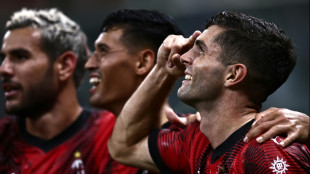 Pulisic strikes, Giroud saves as Milan move top with late drama at Genoa