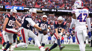 Jones sparks Patriots in Bills NFL upset, Ravens thrash Lions 