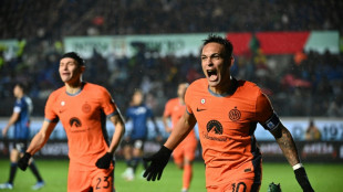 Martinez fires Inter Milan past Atalanta in the rain