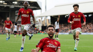 Fernandes rescues Man Utd, Man City hit Bournemouth for six