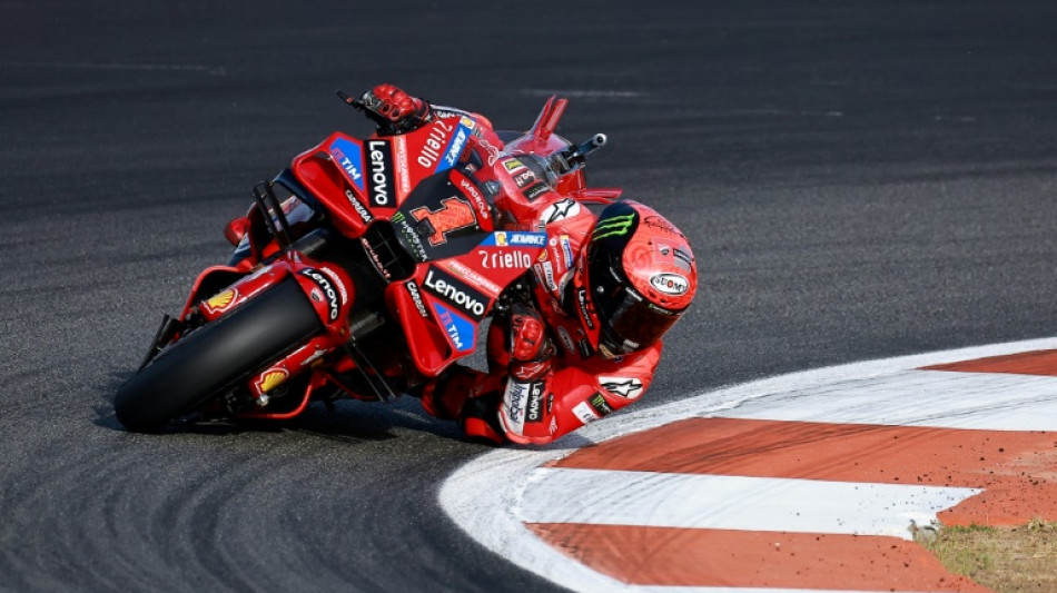 Bagnaia retains MotoGP title in style as Martin crashes