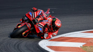 Bagnaia retains MotoGP title in style as Martin crashes